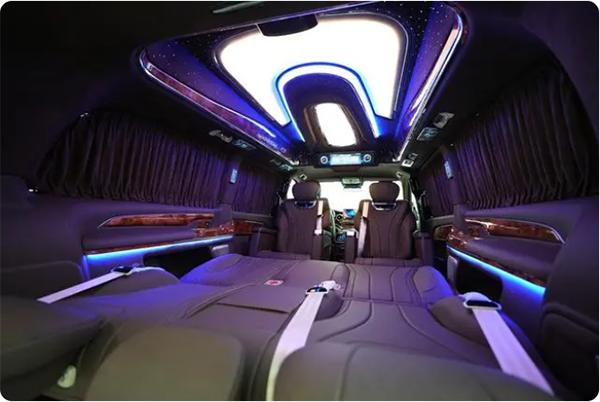 The last row of seats in the high-top Mercedes-Benz Maybach seven-seat van can be turned into a sofa bed