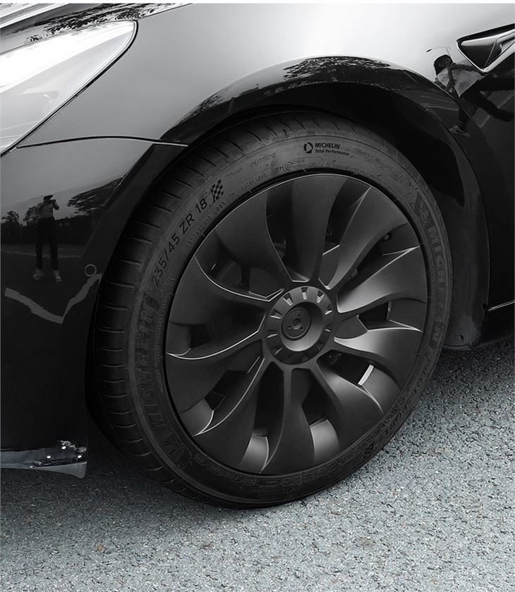 Tesla y 3 hubcap real shot